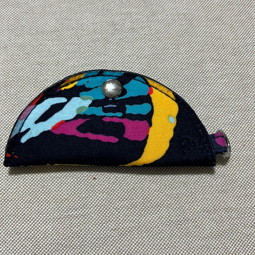 Vera Bradley ford holder. Snaps and had a d ring